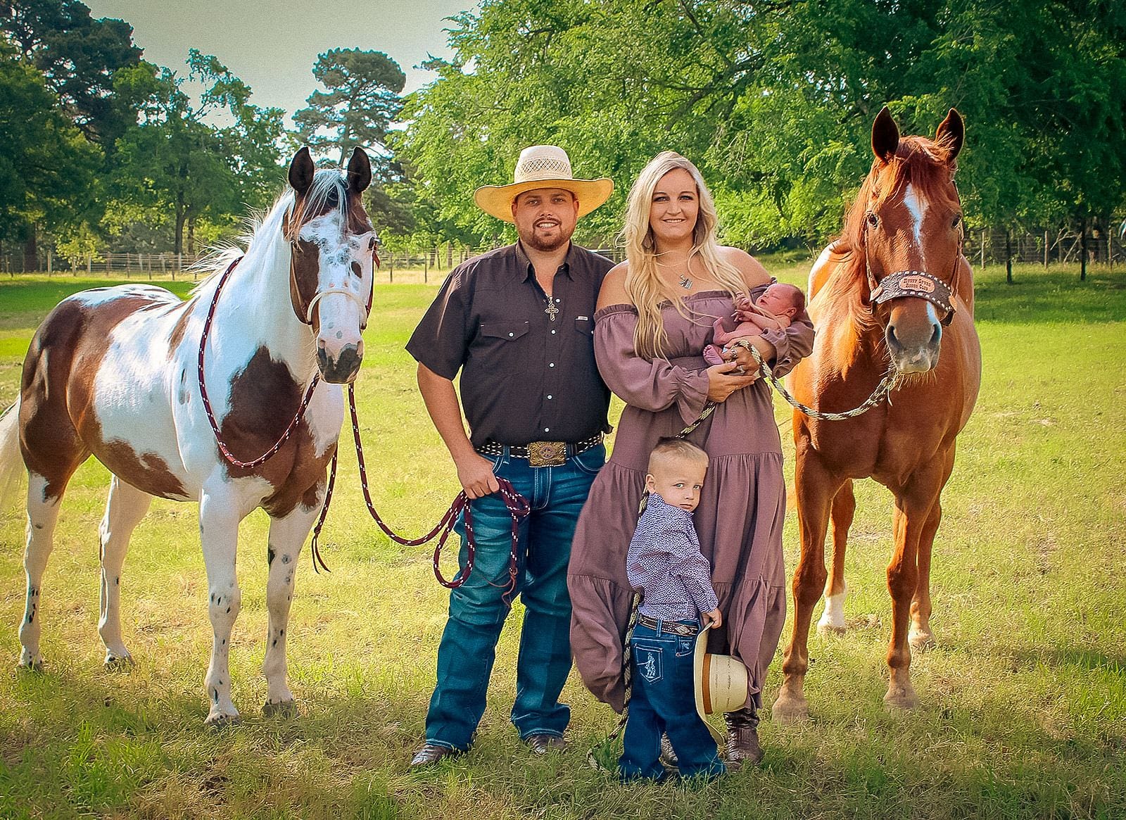Jake and Summer with their two children and horses on their own land in the Brazos Valley